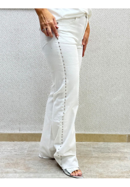 Vaquero blanco tachas