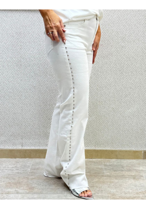 Vaquero blanco tachas