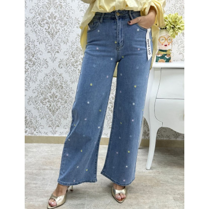 Vaquero flores bordadas